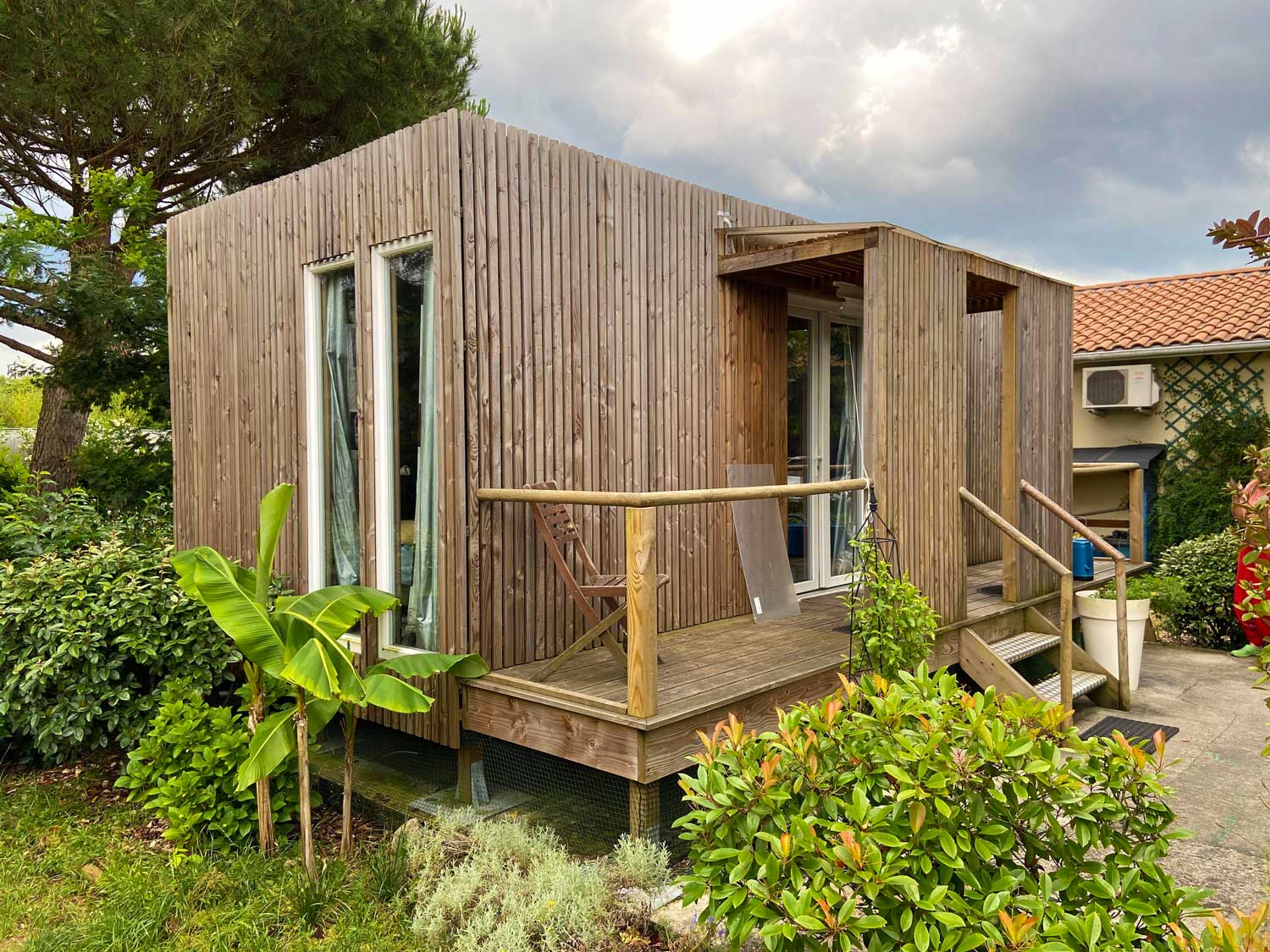 Un studio de jardin en bois