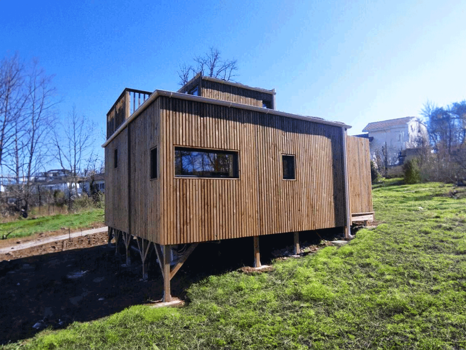 Studio de jardin sur-mesure avec gouttière