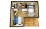 Intérieur aménagé d'un studio de jardin en bois de 25m2