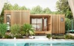 Une maison en bois de 30m2 au bord d'une piscine