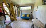 Espace de vie d'une chambre d'hôte de 25m2 dans un studio de jardin