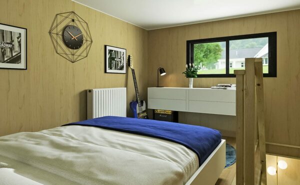 Une chambre aménagée dans un studio de jardin servant de chambre d'hôte et de studio étudiant