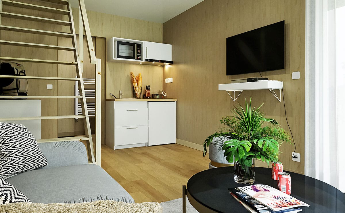 usage-gk30m-salon.jpg Pièce de vie dans une studio de 30m2 avec une mézzanine