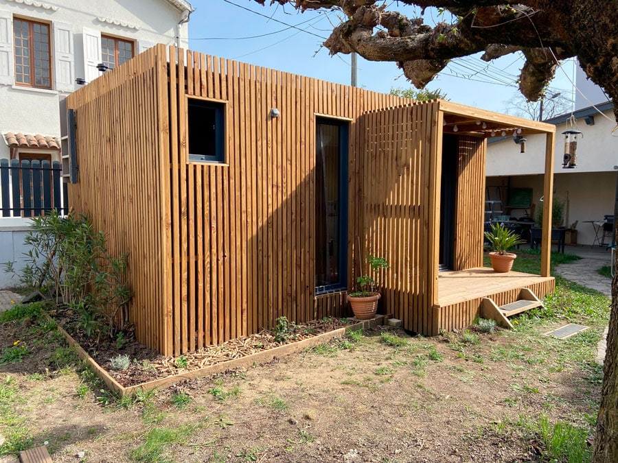 Un studio de jardin en bois